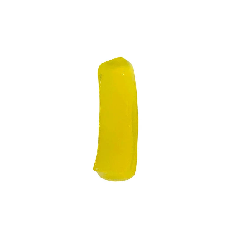 Close-up of peach coconut jelly strip, featuring a translucent golden color and refreshing crunchy, chewy texture.
